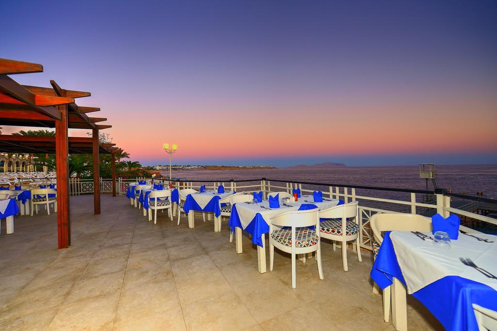 สเตลลา ดี มาเร บีช โฮเทล แอนด์ สปา Hotel ชาร์มเอลชีค ภายนอก รูปภาพ Sunset at the restaurant
